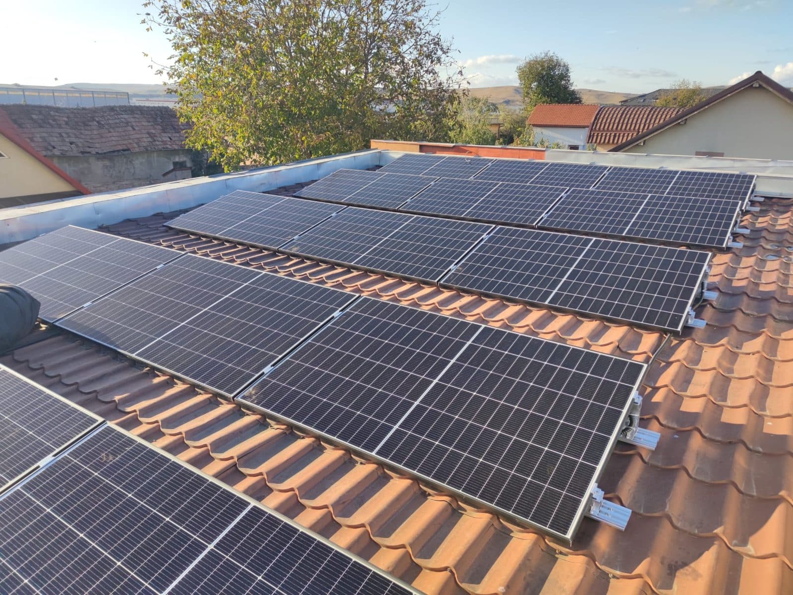 Rows of solar panels on a tiled roof in Apahida, Cluj